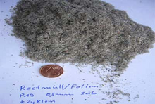 Gewerbemüll, Restmüll und Holz nach der Zerkleinerung mit der Universal Schneidmühle